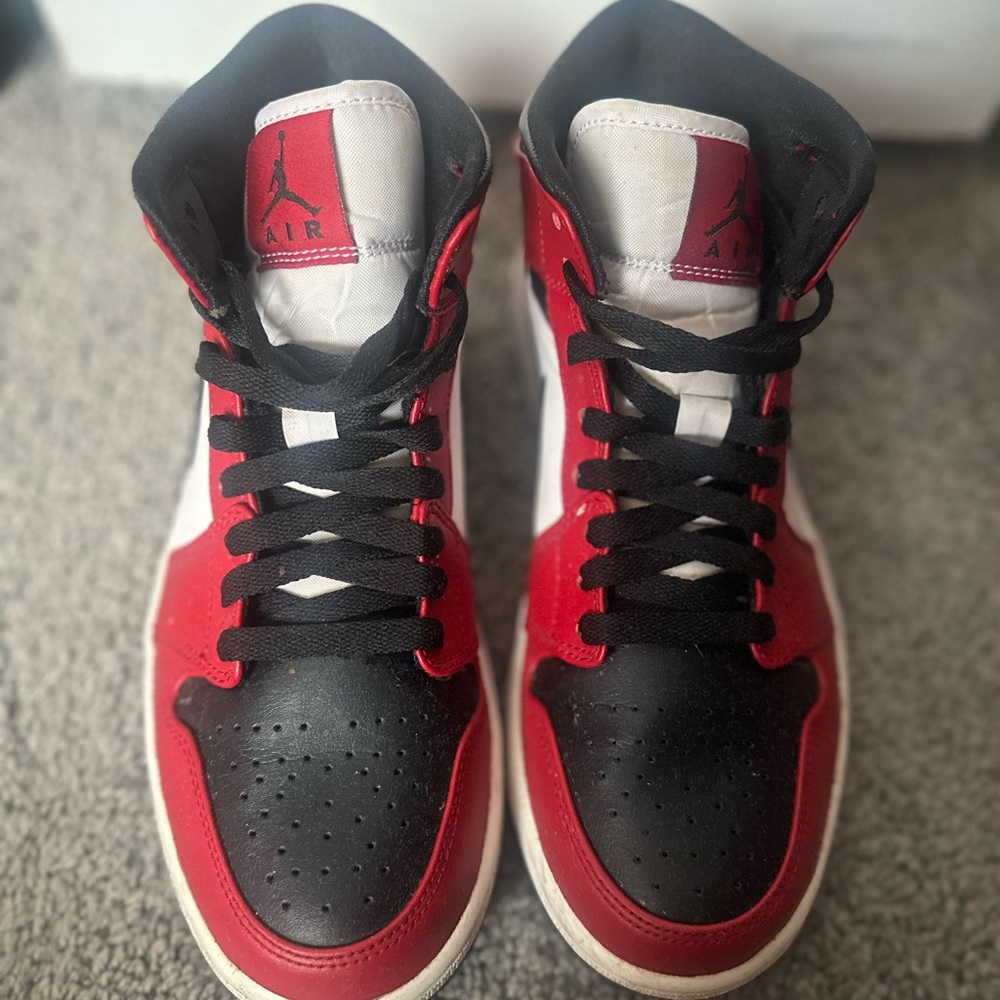 Air Jordan 1 Women’s Black and Red High-Top Sneakers